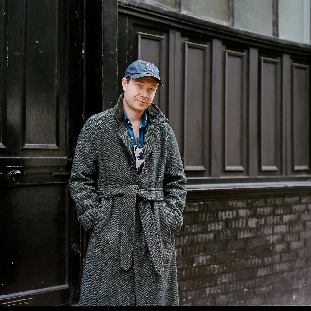 Belted balmacaan coat in handloomed Donegal blue-green herringbone tweed