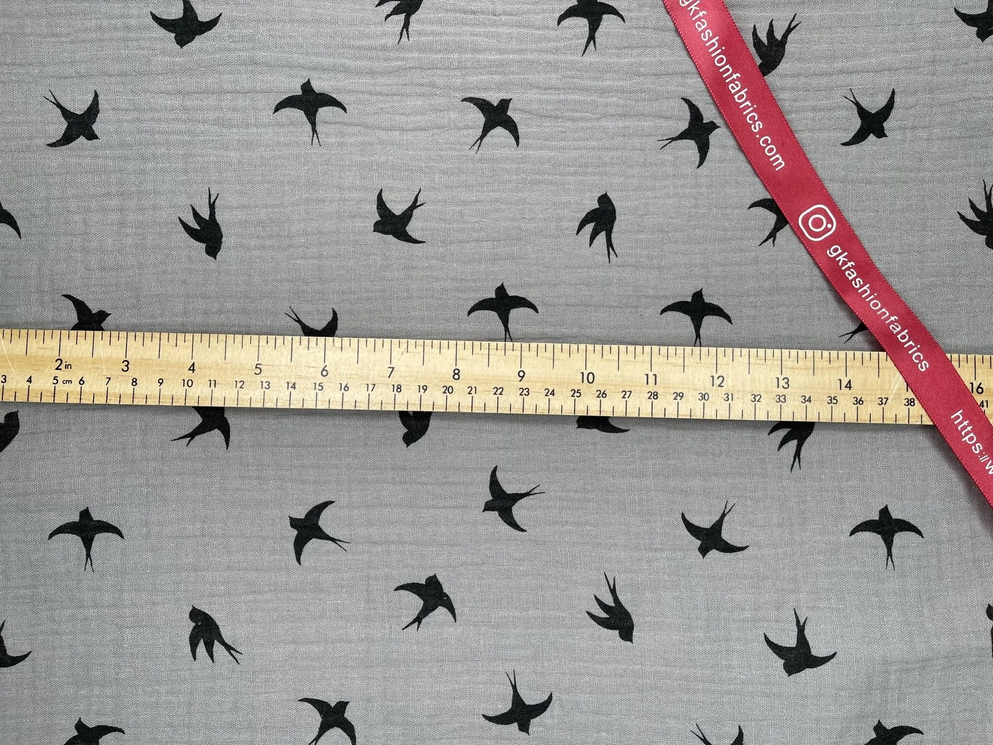 Double layered gauze muslin fabric with swallow print