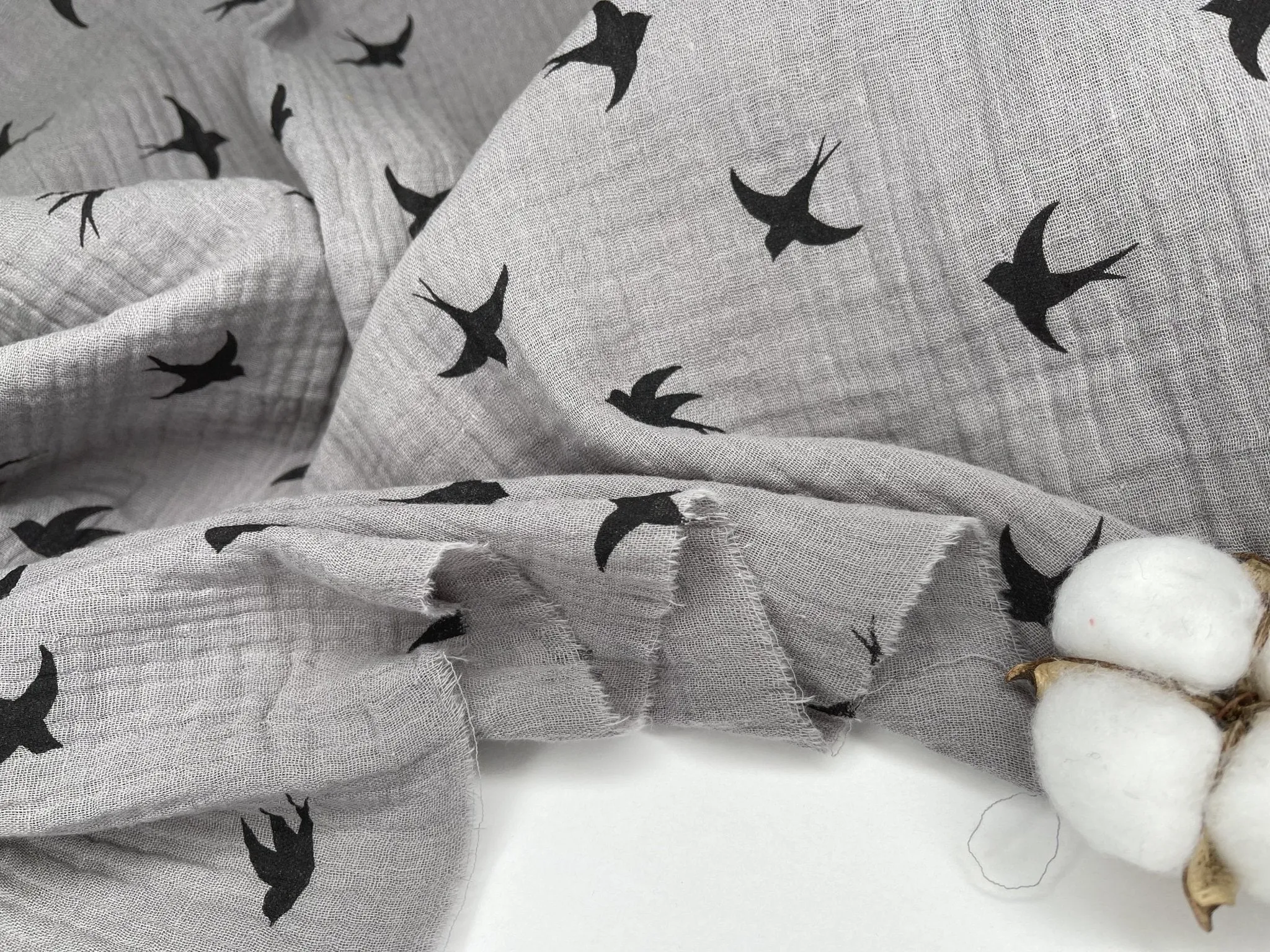 Double layered gauze muslin fabric with swallow print