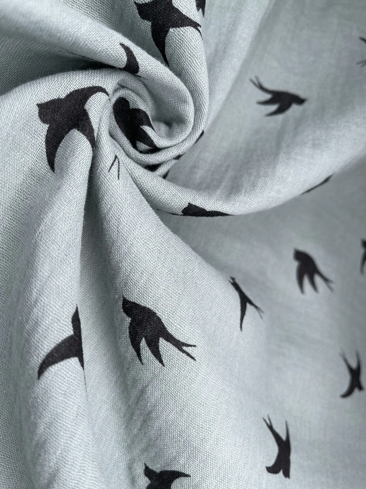 Double layered gauze muslin fabric with swallow print