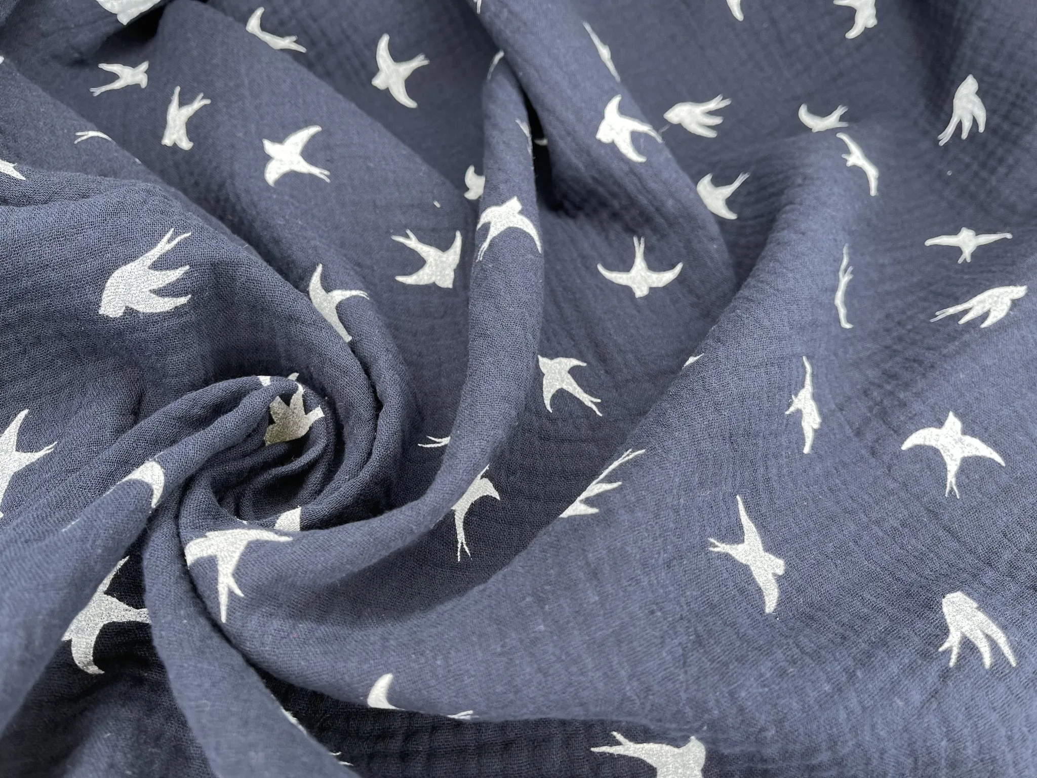 Double layered gauze muslin fabric with swallow print