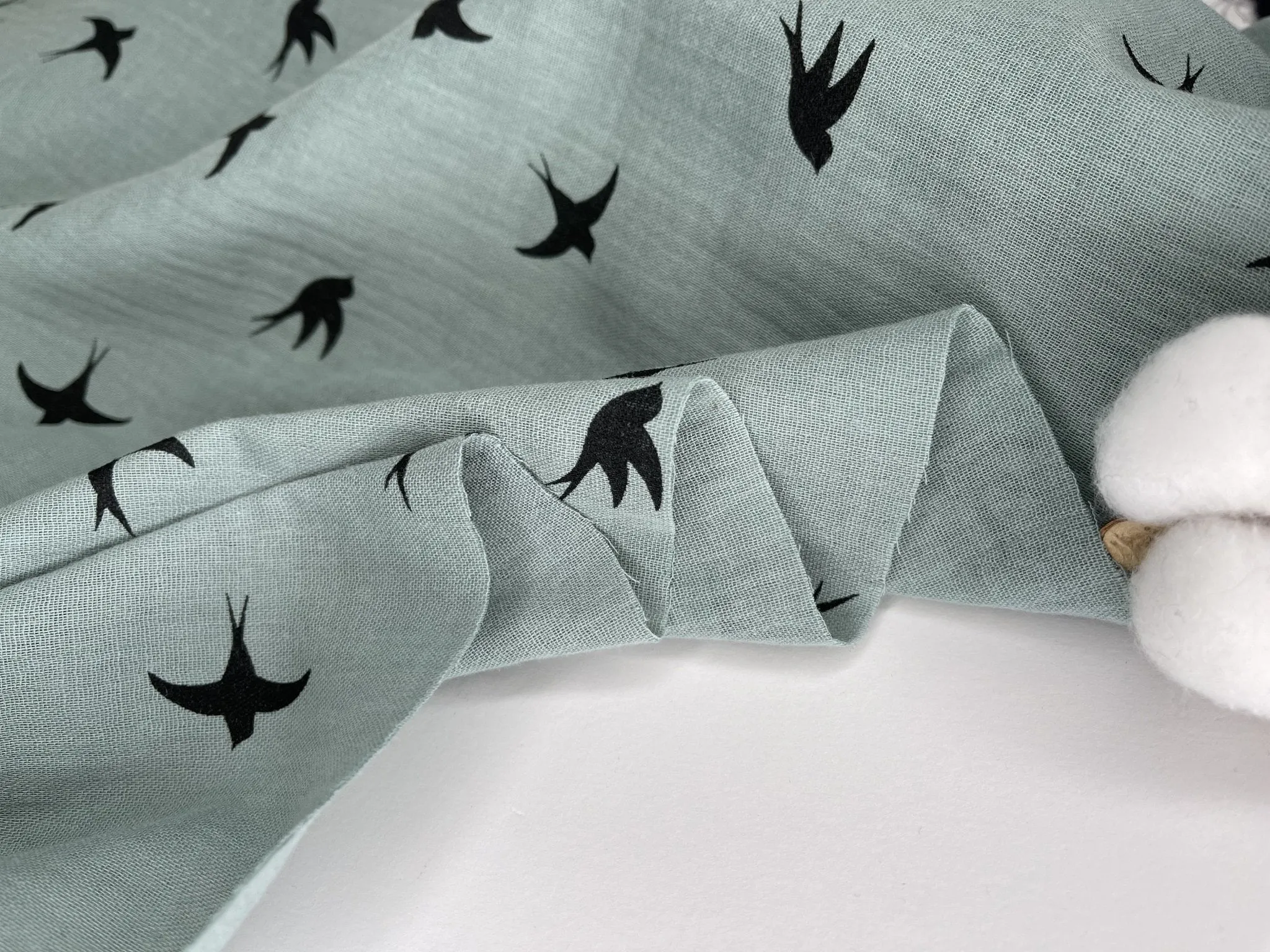 Double layered gauze muslin fabric with swallow print